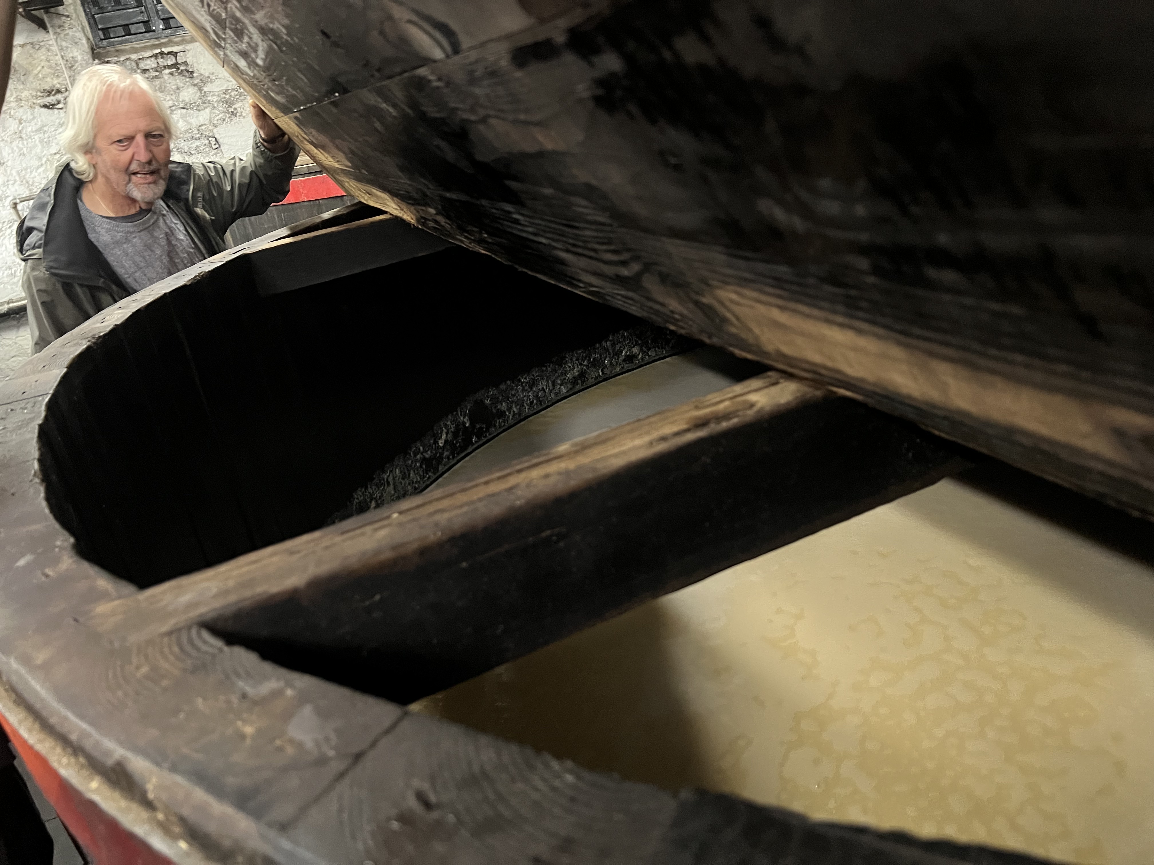 looking down into a fermenting washback